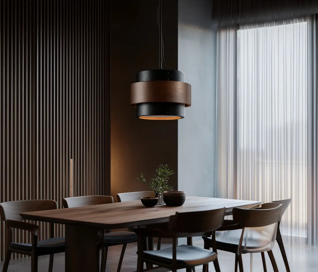 Saturnia tiered travertine and dark wood pendant light – shown in a living room (3)