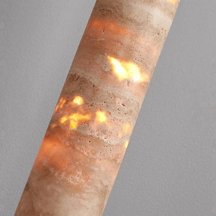 Camarina slim travertine tube pendant light – close-up detail, lit
