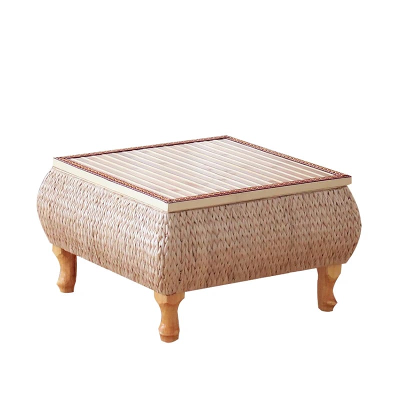 Square wicker coffee table with a storage chest beneath the top