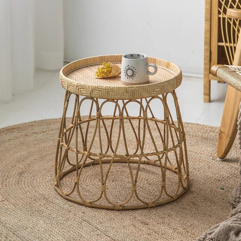 Handwoven wicker coffee table with clean curves – shown in a room setting