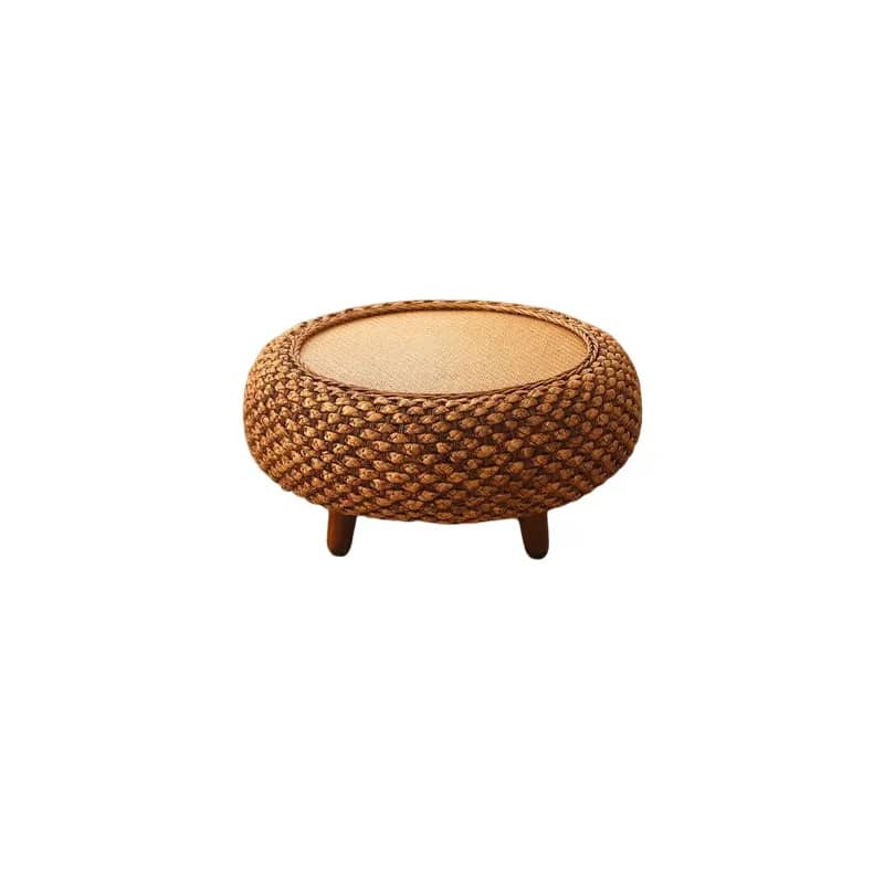 Round handwoven wicker coffee table with an interwoven base