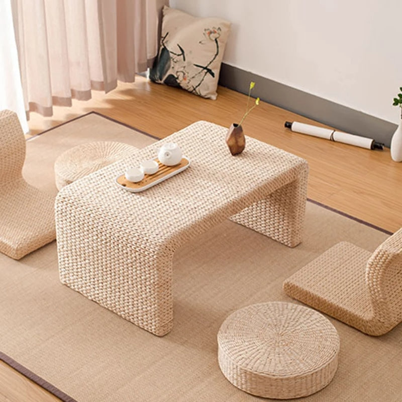 Japanese-style handwoven wicker coffee table with low curves – shown in a room setting (3)