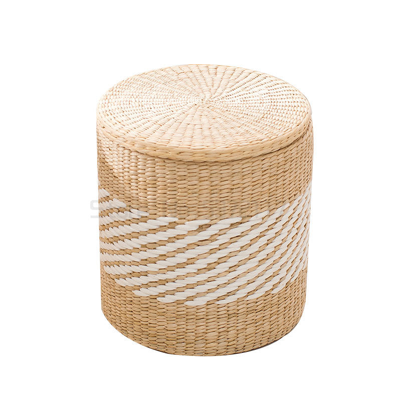 Round beige and white rattan storage stool with a lid