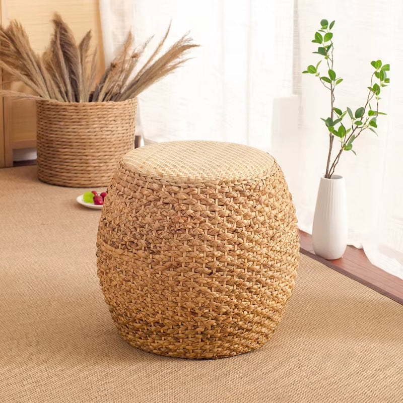 Minimalist round wicker stool with a tightly woven seat – shown in a room setting (3)