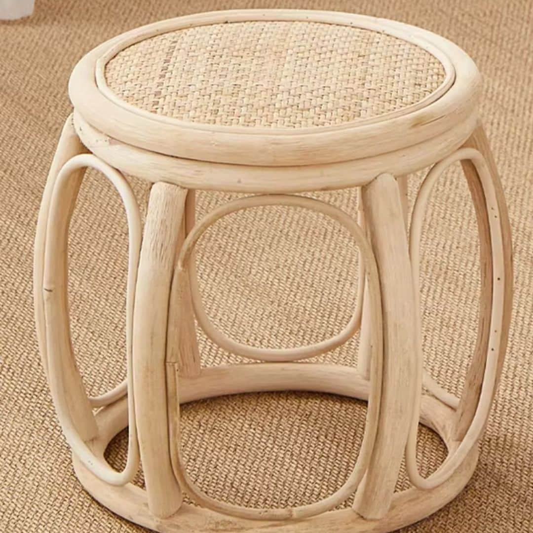 Retro low round wicker stool with a hand-braided seat