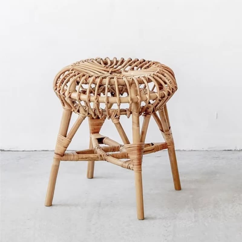 Round Scandinavian wicker stool with slender tapered legs – another view