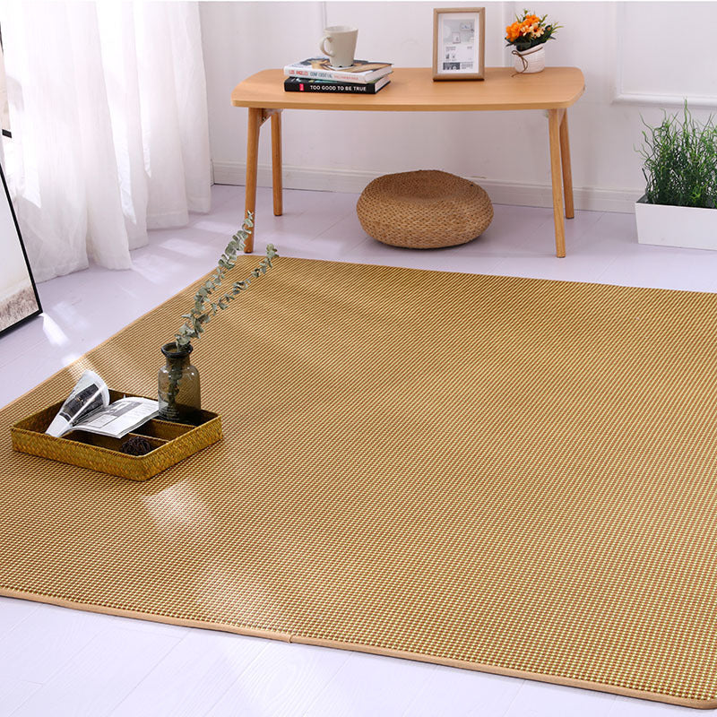 Square Japanese-style handwoven rattan rug – shown in a room setting