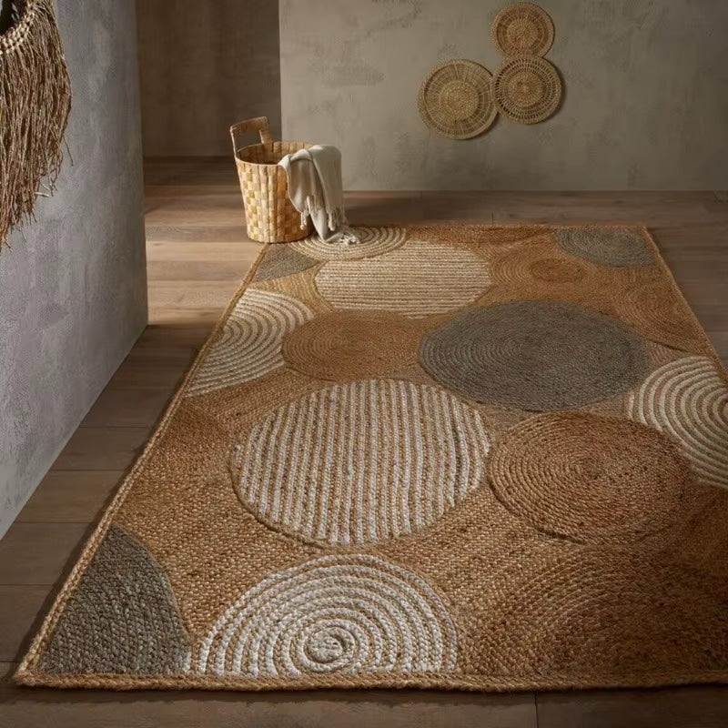 Rectangular herringbone woven natural fiber rug – shown in a room setting