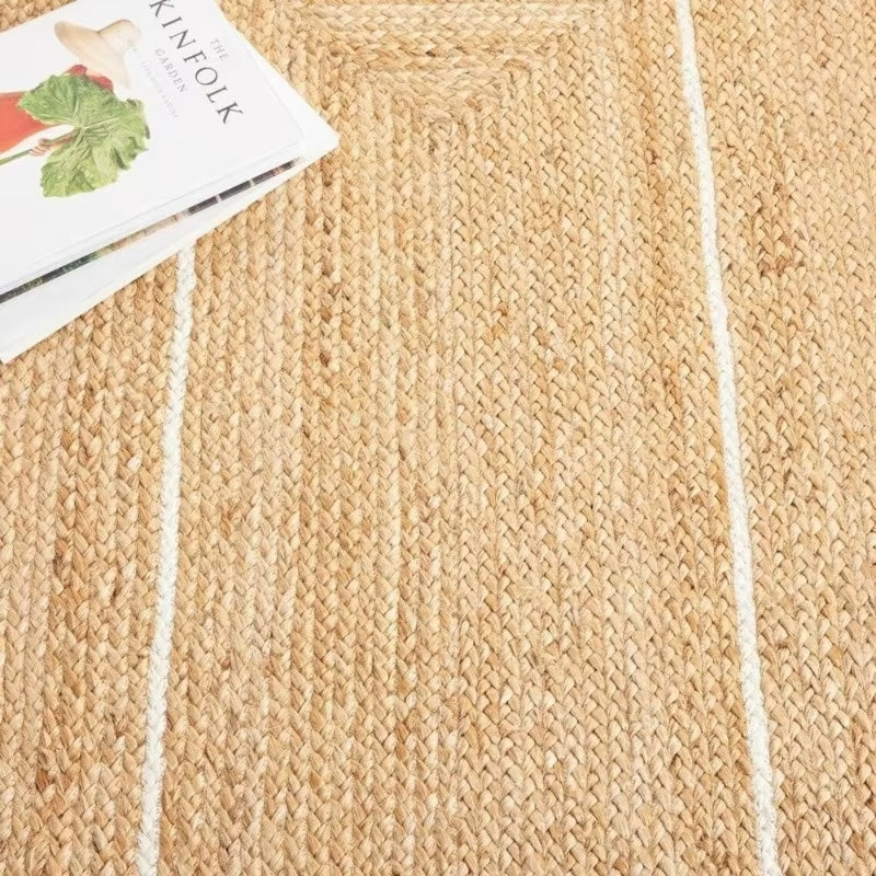 Modern rectangular wicker-look woven rug – close-up detail