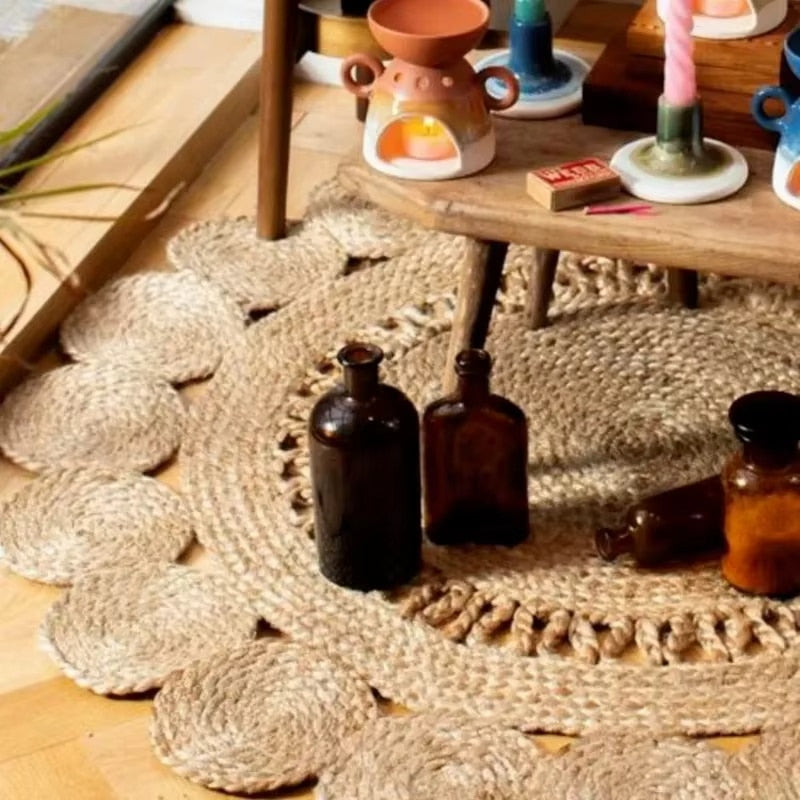 Neutral wicker-look woven rug with warm highlights – shown in a room setting