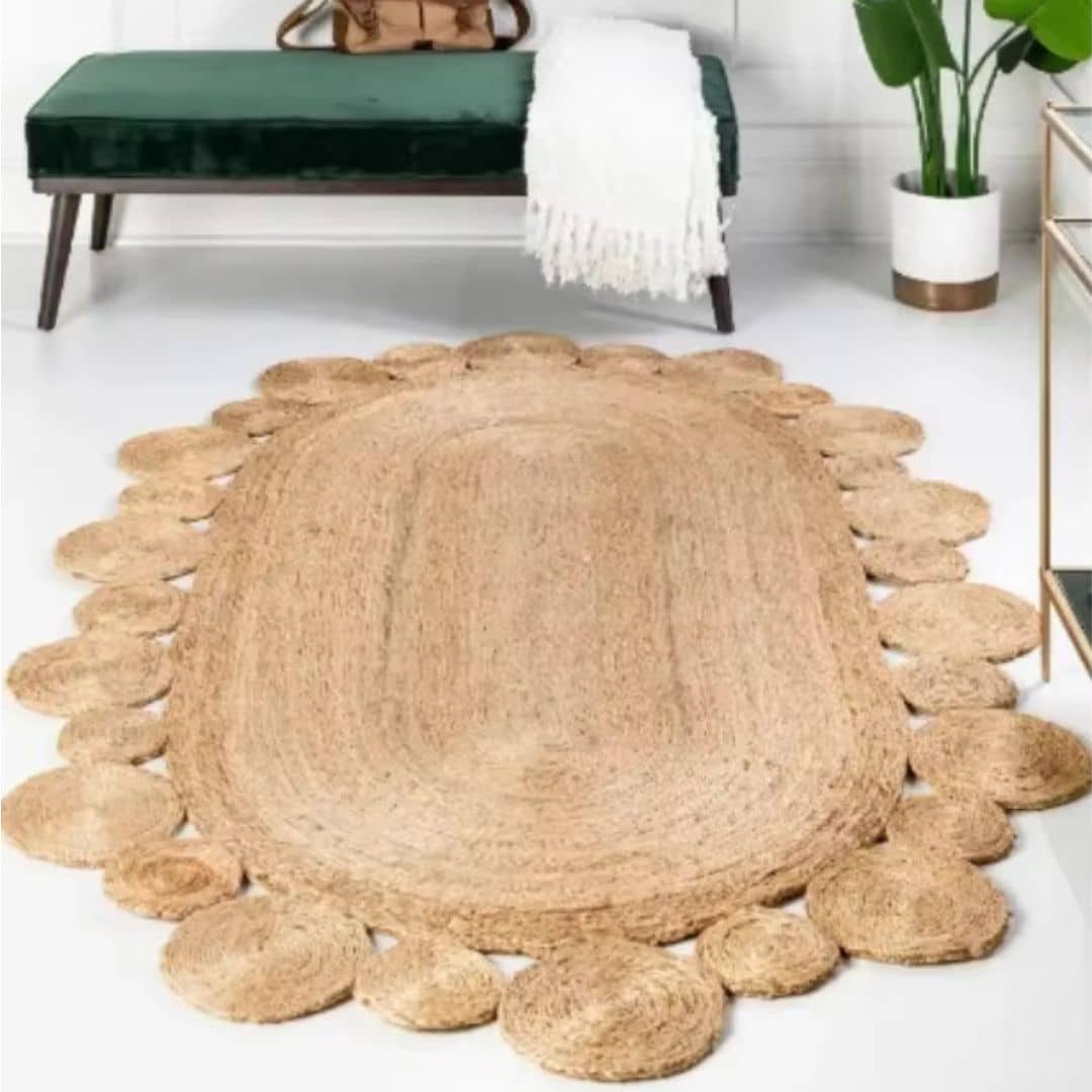 Oval genuine wicker rug with handwoven concentric rings – shown in a room setting