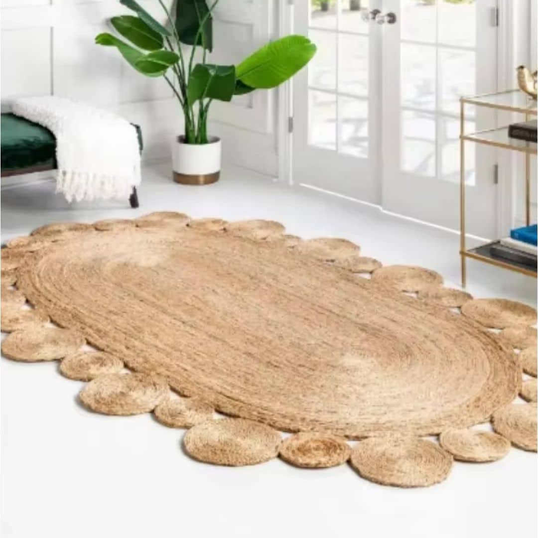 Oval genuine wicker rug with handwoven concentric rings – shown in a room setting (2)