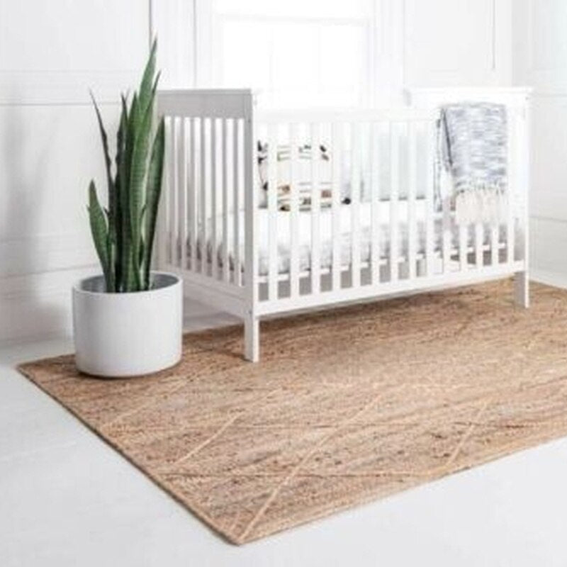 Rectangular rattan rug with a regular cross pattern – shown in a room setting (2)
