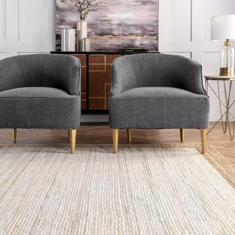 Rectangular white and beige handwoven rug – shown in a room setting (3)