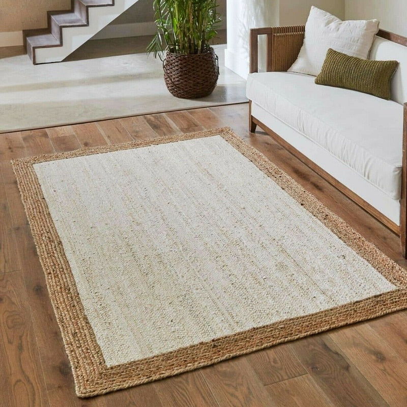 Rectangular white and beige handwoven rug – shown in a room setting