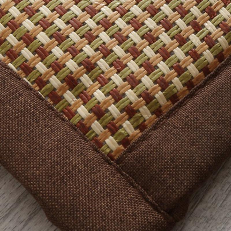 Thick flat-woven synthetic rattan rug – close-up detail