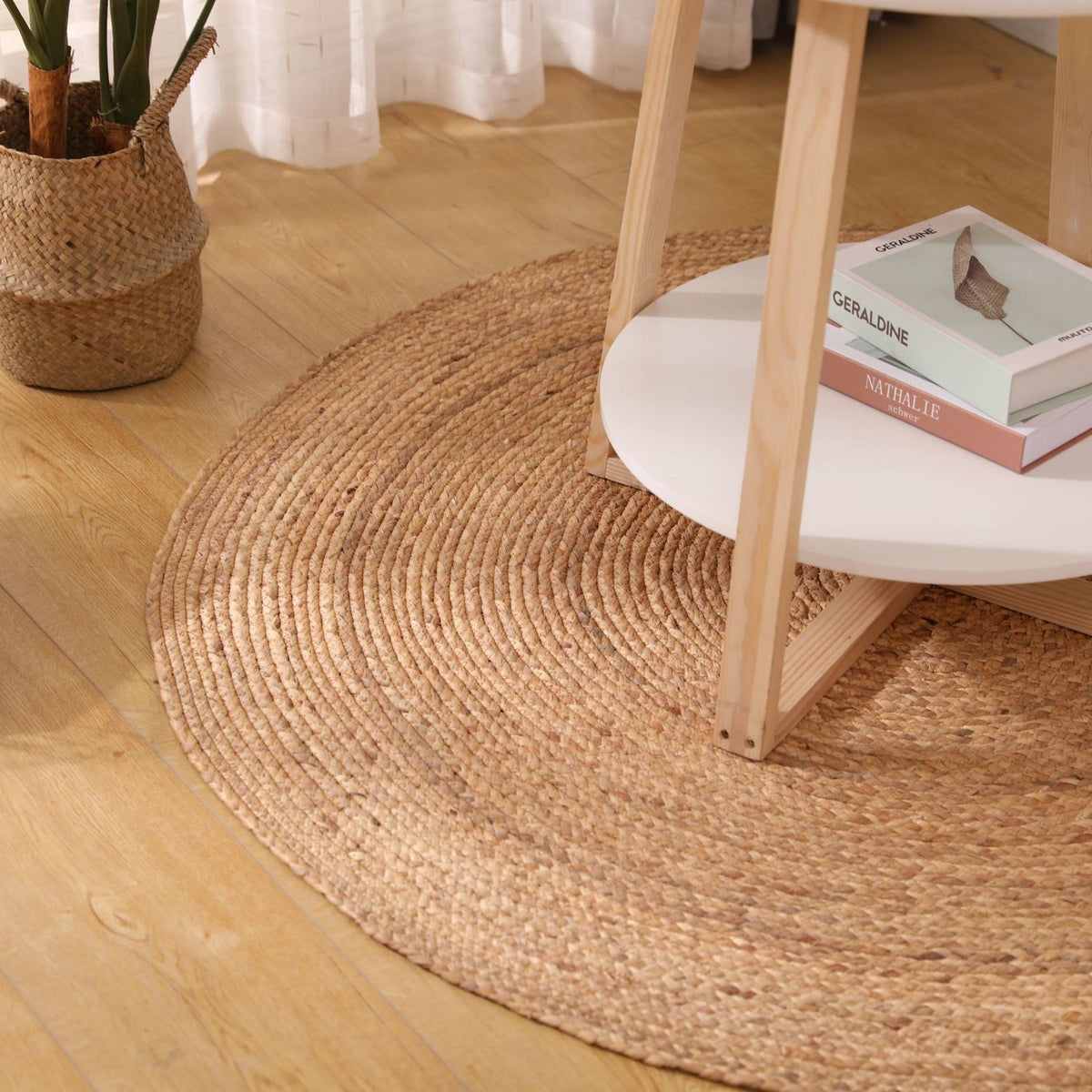Round light honey rattan rug with a relief texture – shown in a room setting (3)