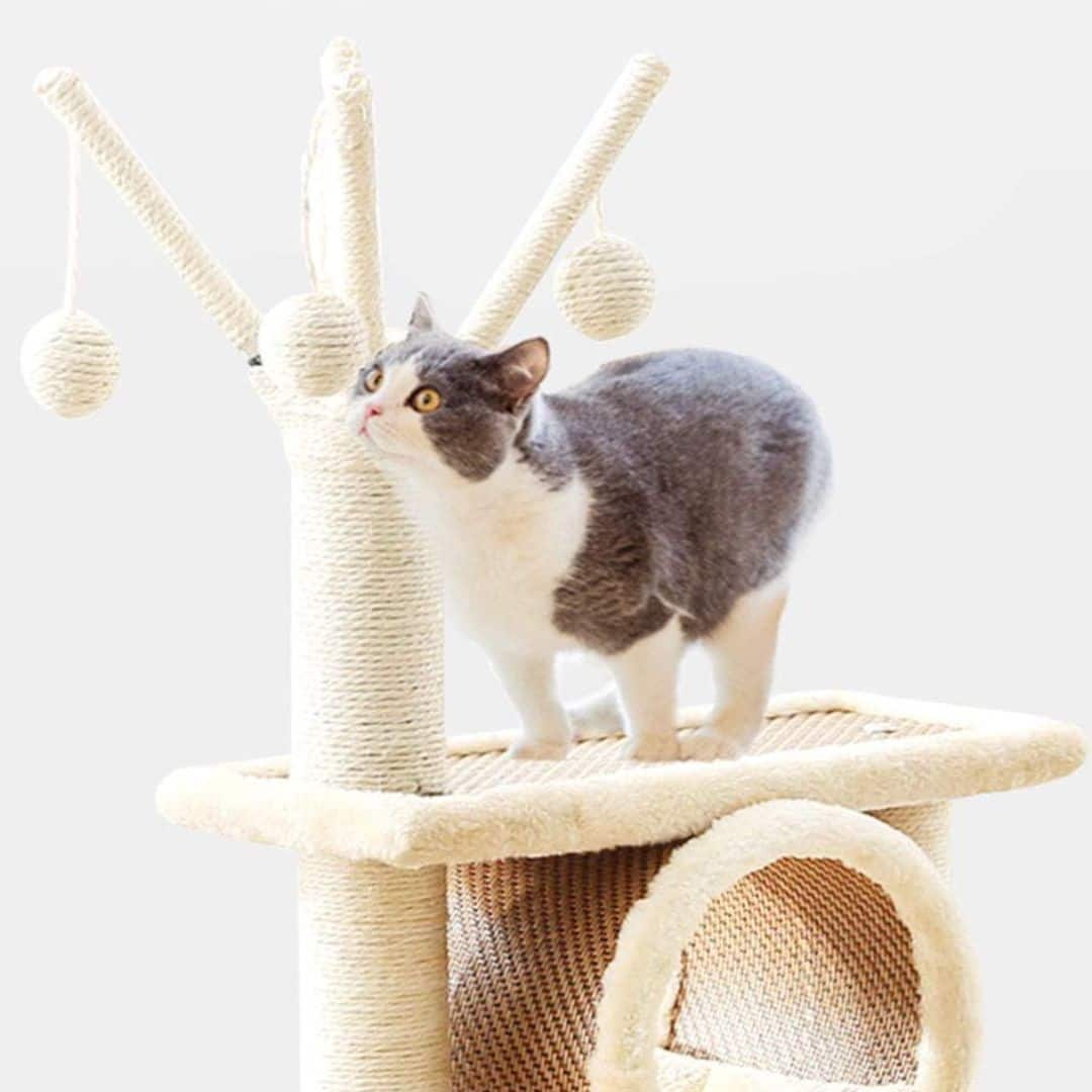 Rattan cat tower with soft fleece lining – shown in a room setting (2)