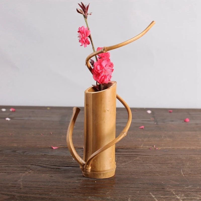 Decorative cylindrical handwoven bamboo vase – shown in a room setting