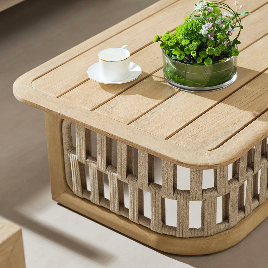 Teak coffee table with a slatted rope base